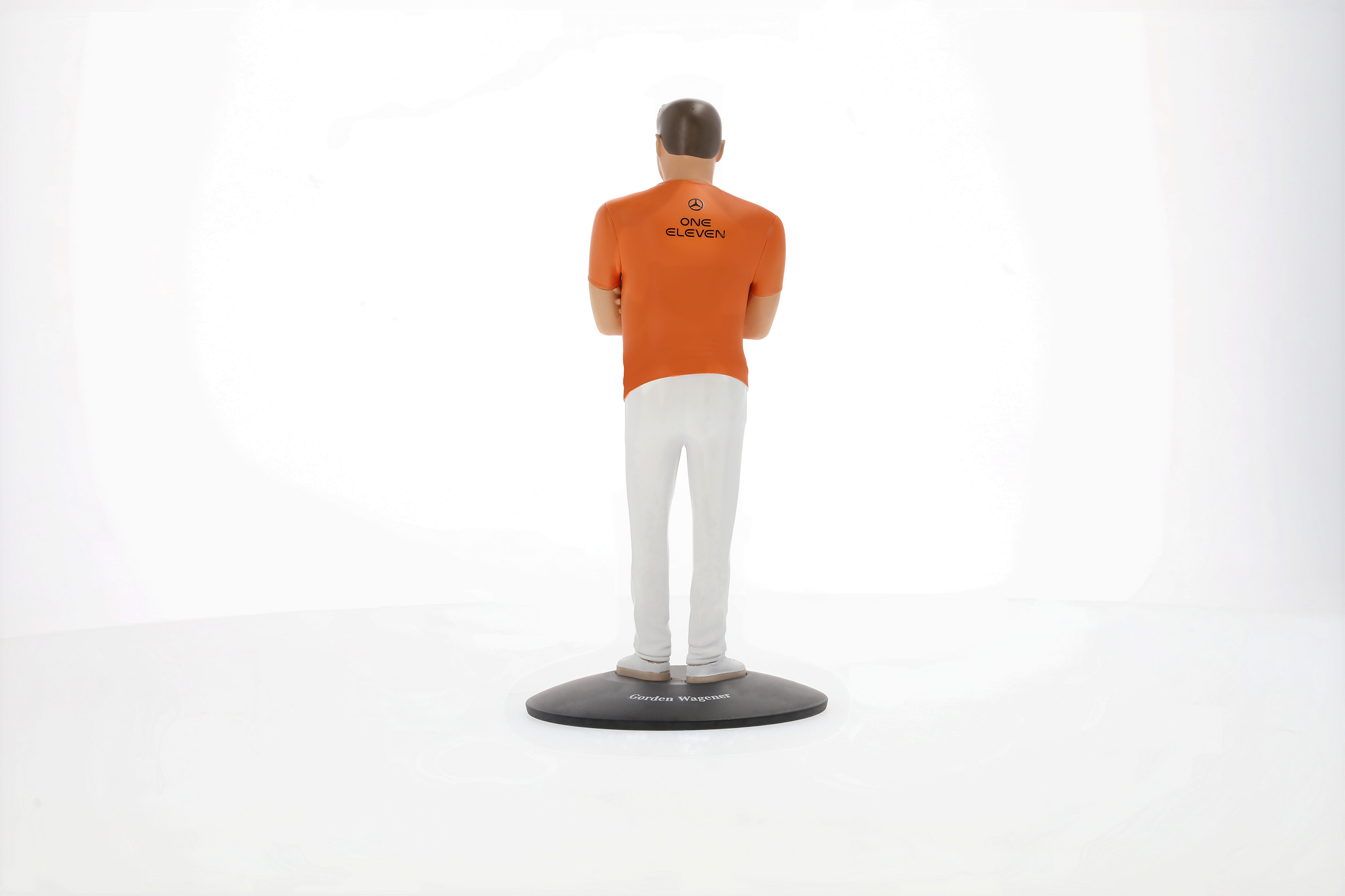 Kit Vision One-Eleven con figurita, Vehículo de exposición - naranja, NZG, 1:18