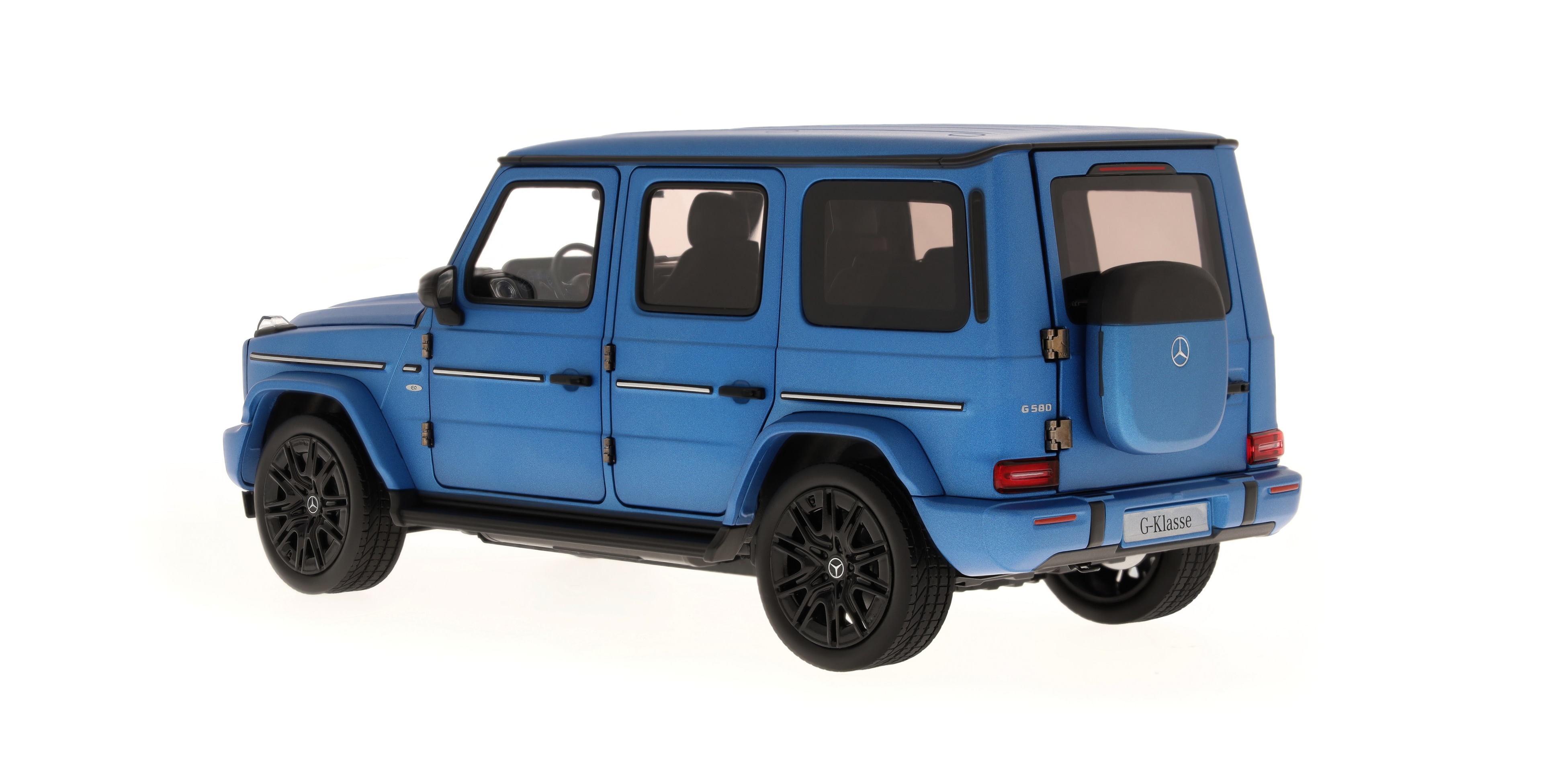 G 580 con tecnología EQ, Vehículo todoterreno, AMG Line, N465 - MANUFAKTUR azul Mar del Sur magno, Norev, 1:18